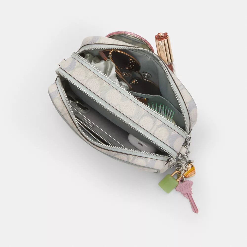 Mini Carey Crossbody Bag in Signature Canvas