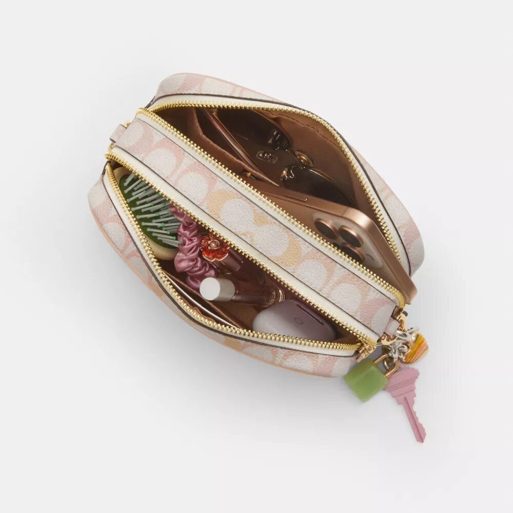 Mini Carey Crossbody Bag in Signature Canvas