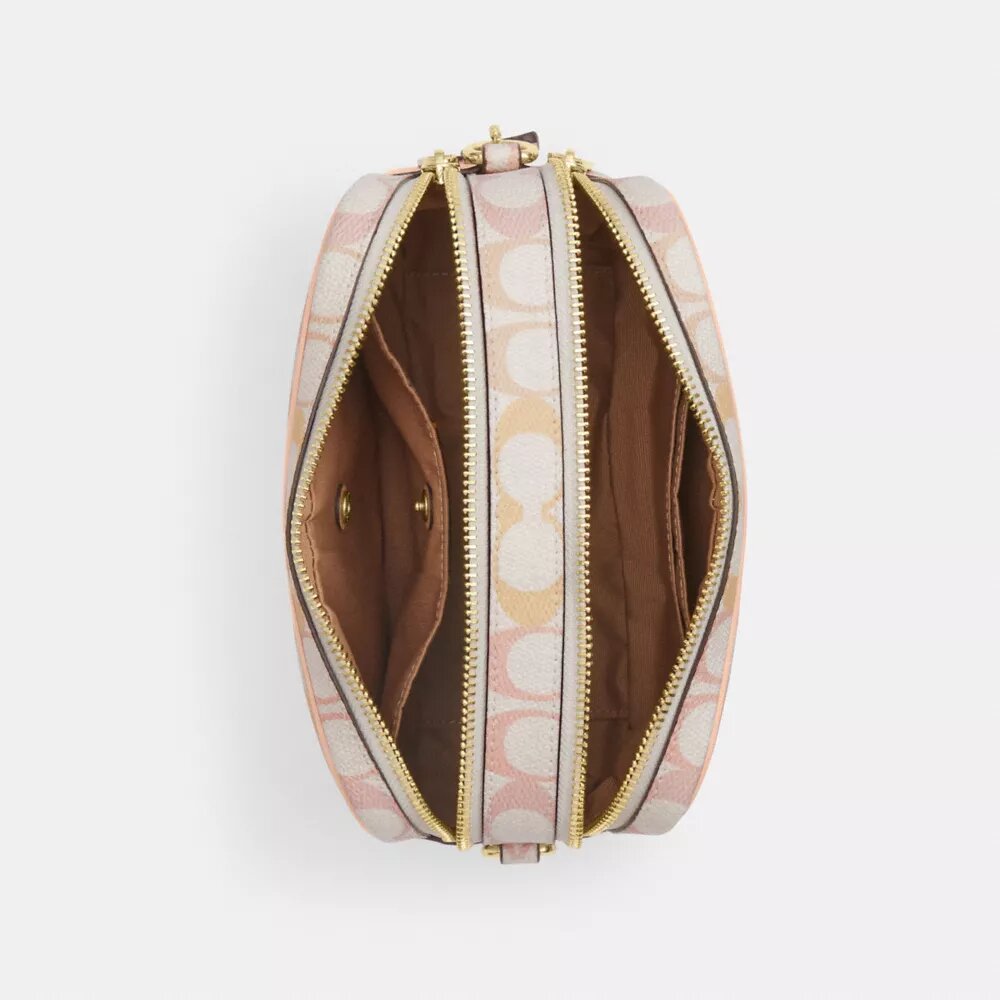 Mini Carey Crossbody Bag in Signature Canvas