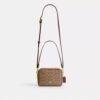 Mini Carey Crossbody Bag in Signature Canvas