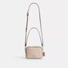 Mini Carey Crossbody Bag in Signature Canvas