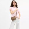 Mini Carey Crossbody Bag in Signature Canvas