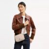 Mini Carey Crossbody Bag in Signature Canvas