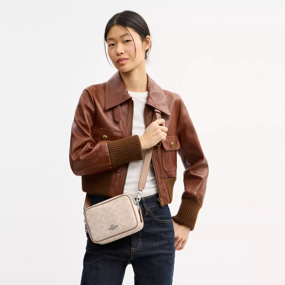 Mini Carey Crossbody Bag in Signature Canvas