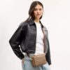 Mini Carey Crossbody Bag in Signature Canvas