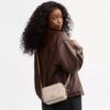 Mini Carey Crossbody Bag in Signature Canvas