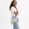 Mini Carey Crossbody Bag in Signature Canvas