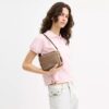 Mini Carey Crossbody Bag in Signature Canvas