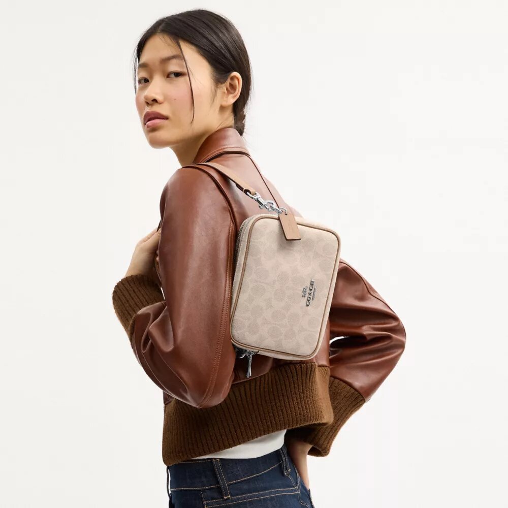 Mini Carey Crossbody Bag in Signature Canvas