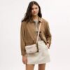 Mini Carey Crossbody Bag in Signature Canvas