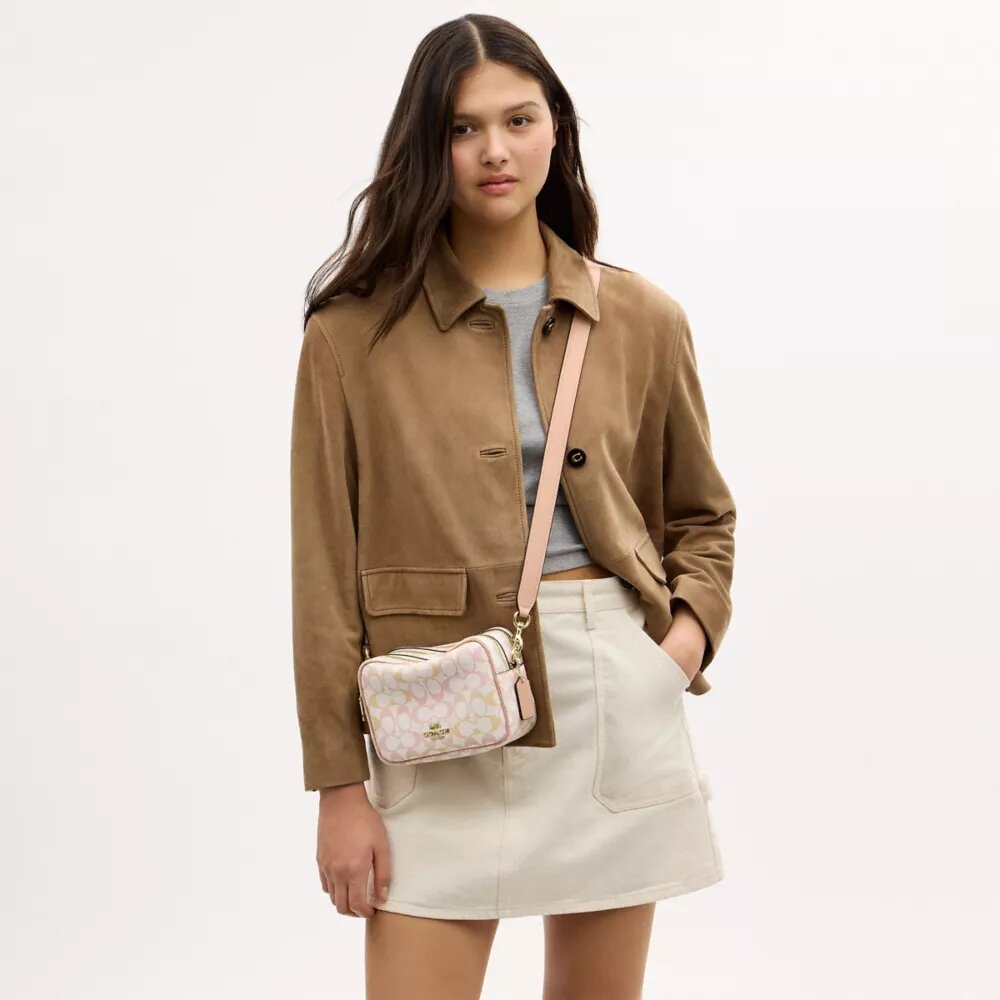 Mini Carey Crossbody Bag in Signature Canvas