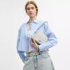 Mini Carey Crossbody Bag in Signature Canvas