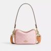 Mini Carey Crossbody Bag in Signature Canvas with Charms