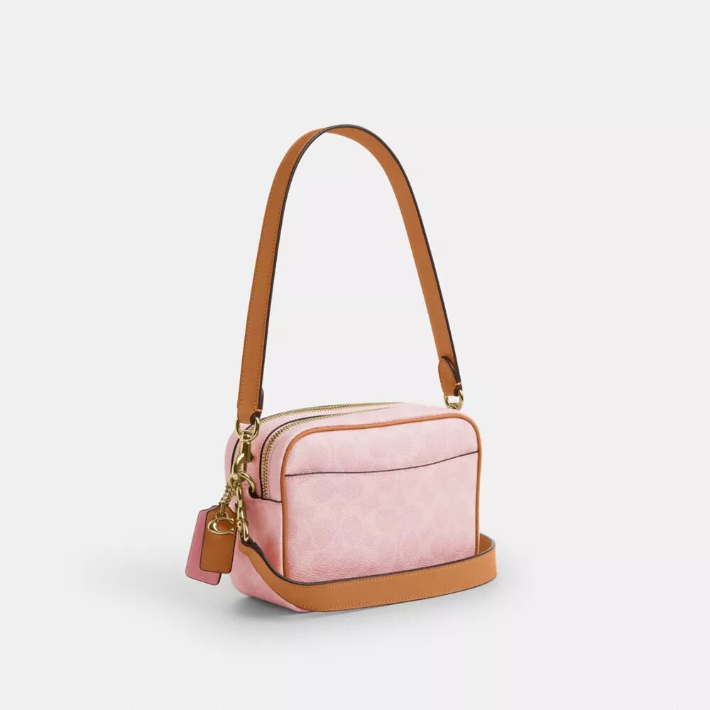 Mini Carey Crossbody Bag in Signature Canvas with Charms