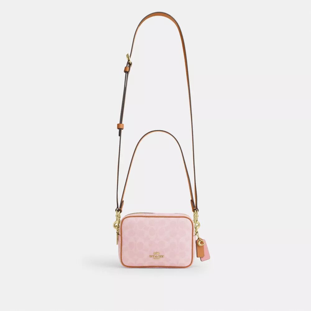 Mini Carey Crossbody Bag in Signature Canvas with Charms