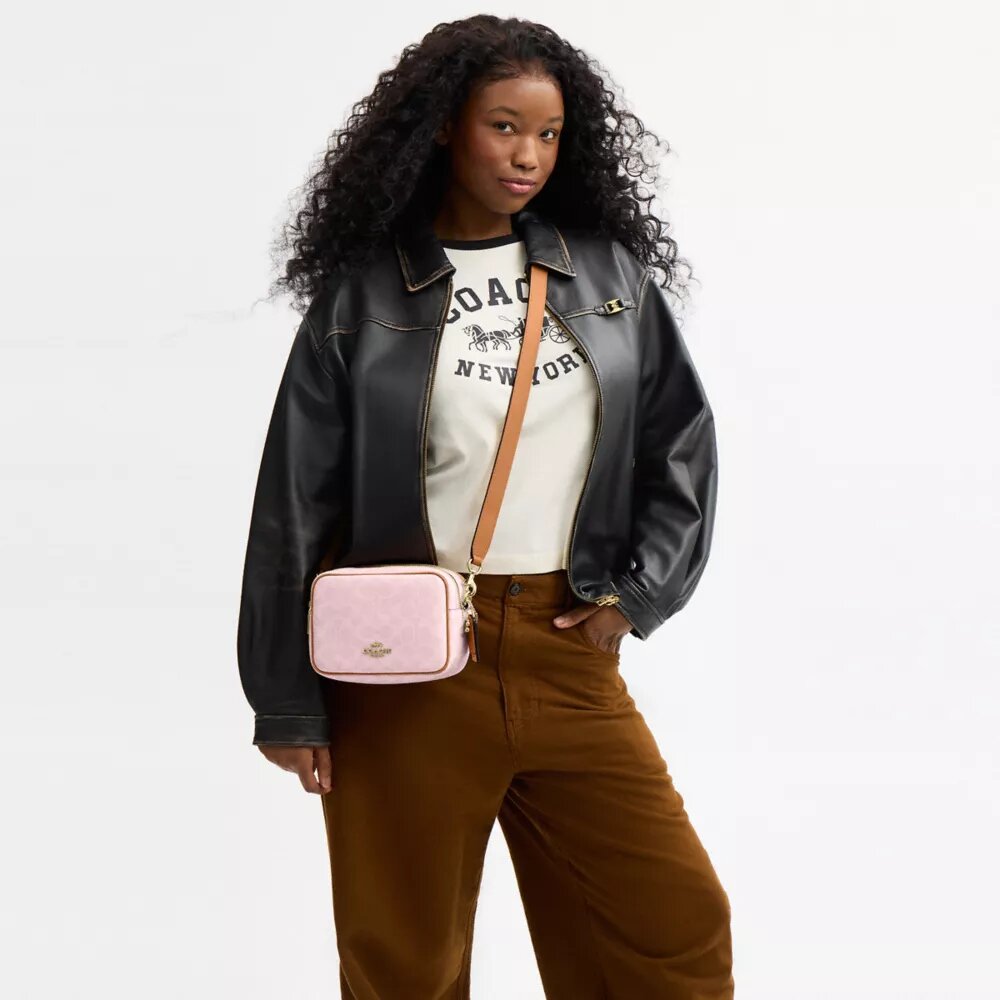 Mini Carey Crossbody Bag in Signature Canvas with Charms
