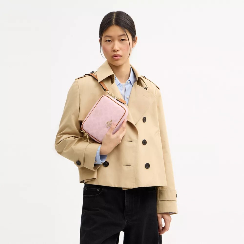 Mini Carey Crossbody Bag in Signature Canvas with Charms