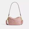 Mini Carey Crossbody Bag in Signature Denim