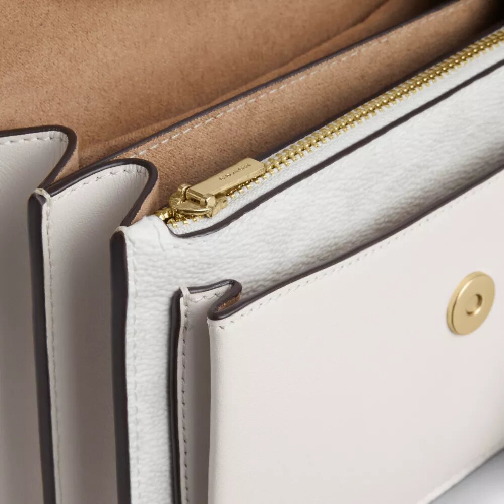 Mini Klare Crossbody Bag in Signature Canvas