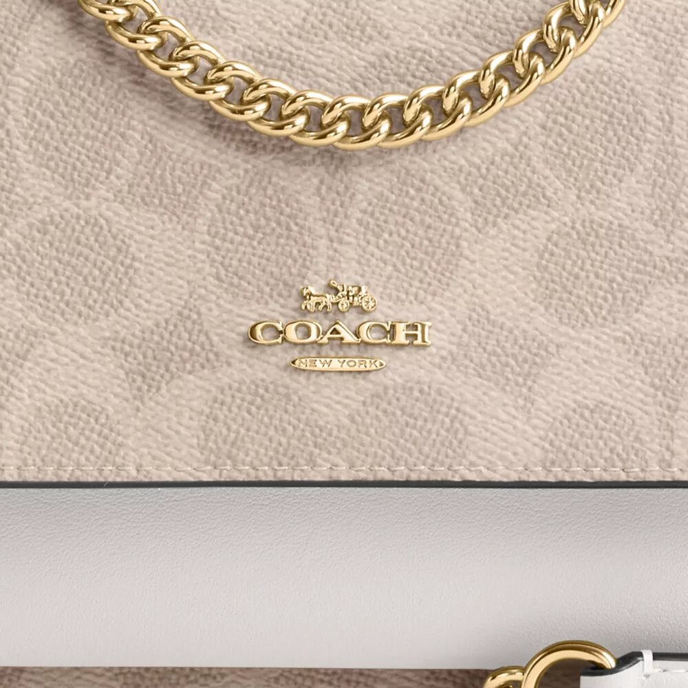 Mini Klare Crossbody Bag in Signature Canvas