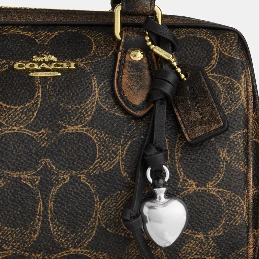 Mini Rowan Crossbody Bag in Loved Signature Canvas with Charms
