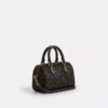 Mini Rowan Crossbody Bag in Loved Signature Canvas with Charms