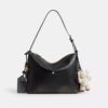Mott Messenger Bag 38 in Loved Leather with Charms