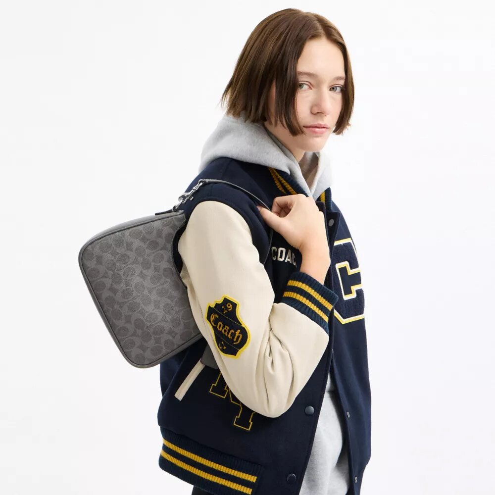 Nolan Hobo Bag in Signature Canvas