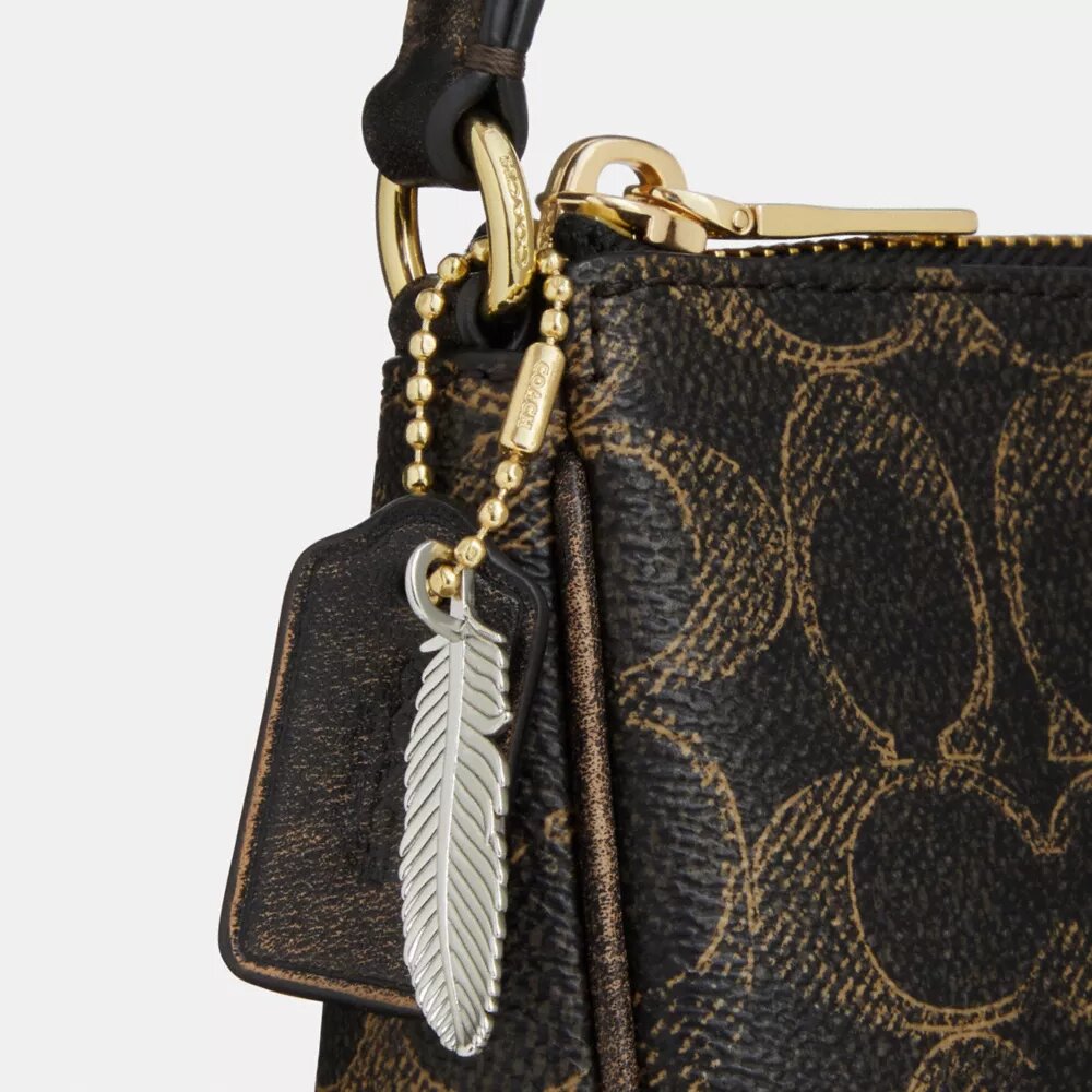 Nolita 19 in Loved Signature Canvas with Charms
