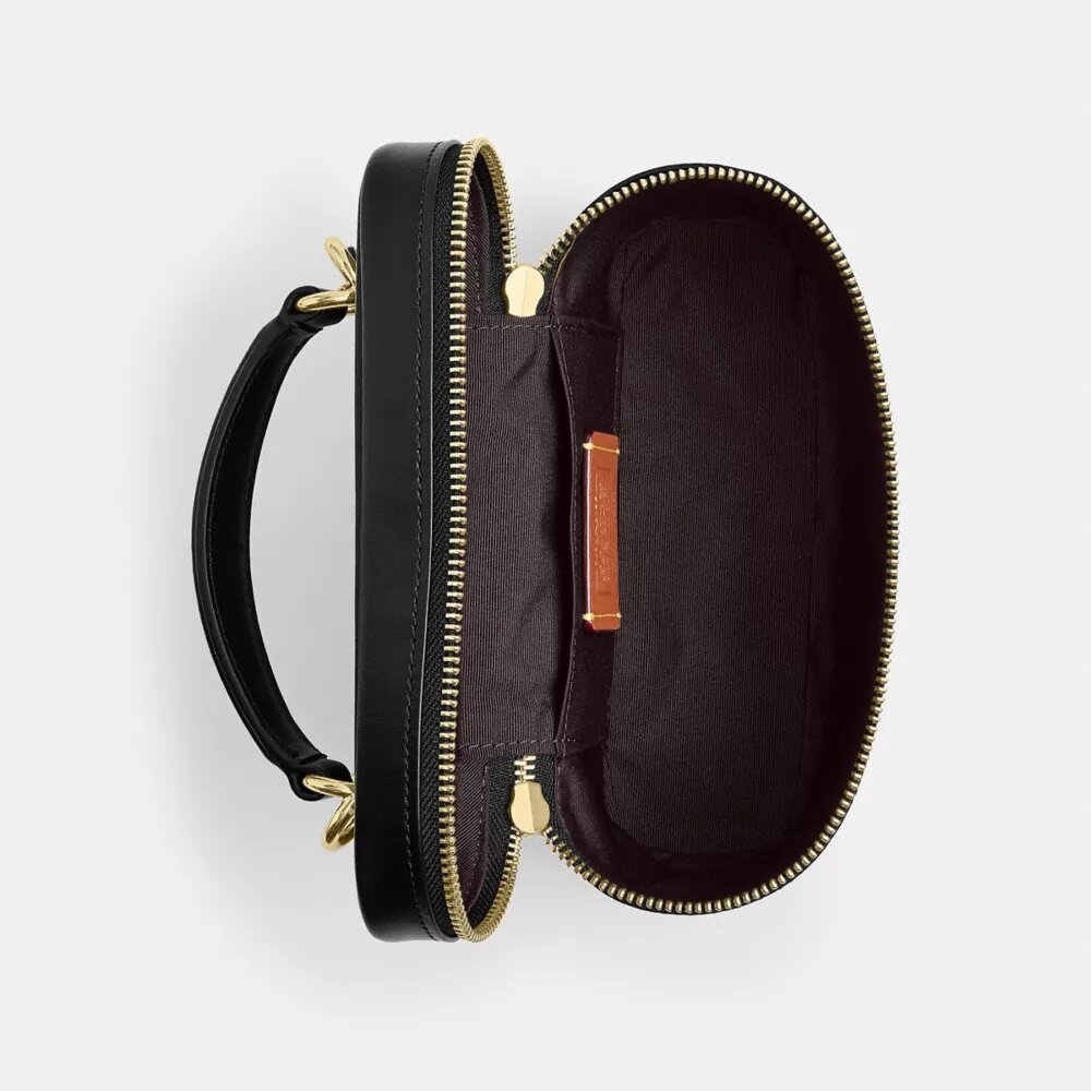 Rainer Crossbody Bag 18 in Signature Canvas