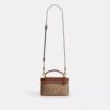 Rainer Crossbody Bag 18 in Signature Canvas