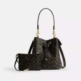 Rowan Bucket Bag in Loved Signature Canvas with Charms