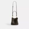 Rowan Bucket Bag in Loved Signature Canvas with Charms