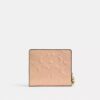 Snap Wallet in Signature Leather with Charm
