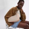 Teri Hobo Bag in Signature Canvas