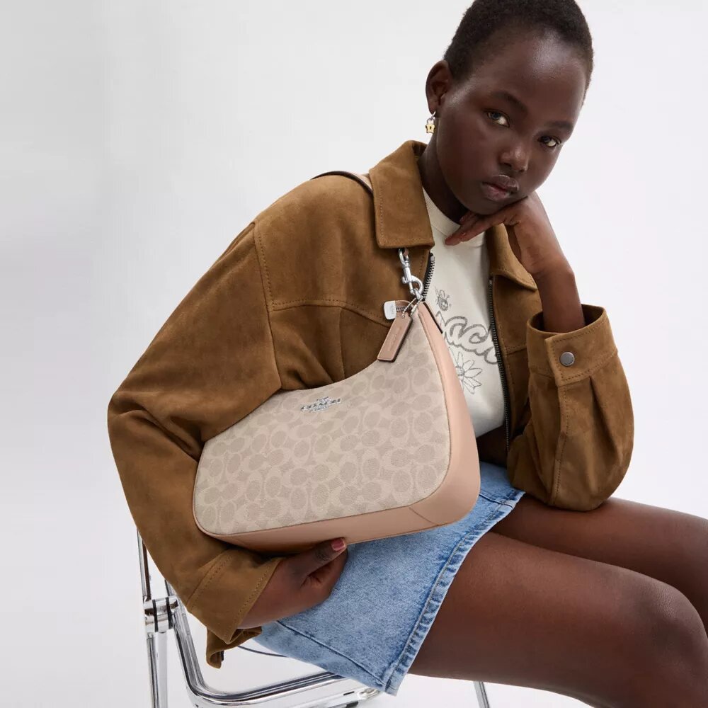 Teri Hobo Bag in Signature Canvas