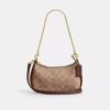 Teri Mini Crossbody Bag in Signature Canvas