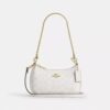 Teri Mini Crossbody Bag in Signature Canvas