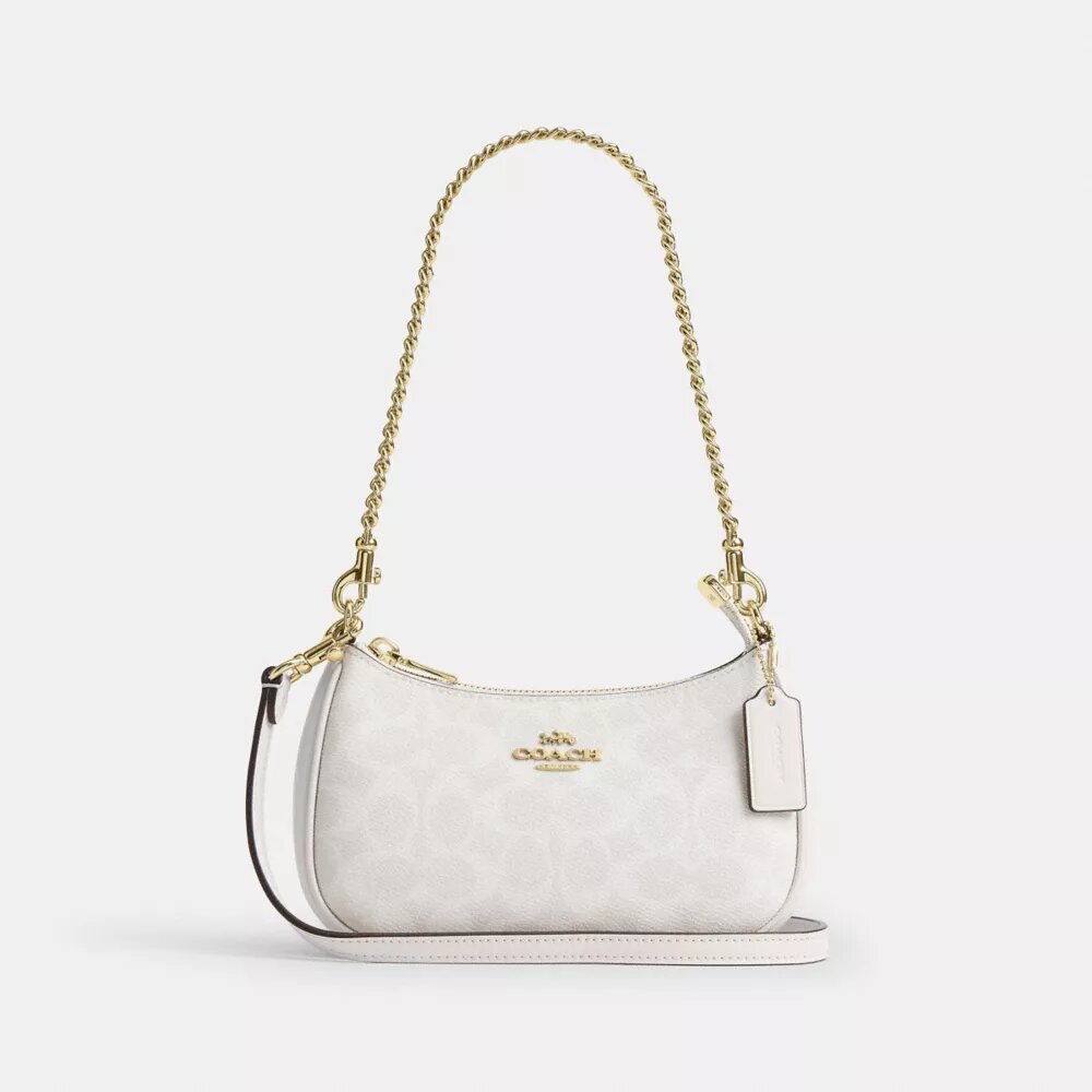 Teri Mini Crossbody Bag in Signature Canvas