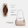 Teri Mini Crossbody Bag in Signature Canvas