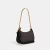 Teri Mini Crossbody Bag in Signature Canvas