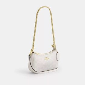 Teri Mini Crossbody Bag in Signature Canvas