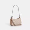 Teri Mini Crossbody Bag in Signature Canvas