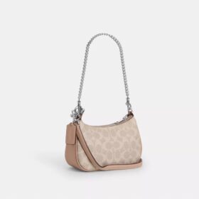 Teri Mini Crossbody Bag in Signature Canvas
