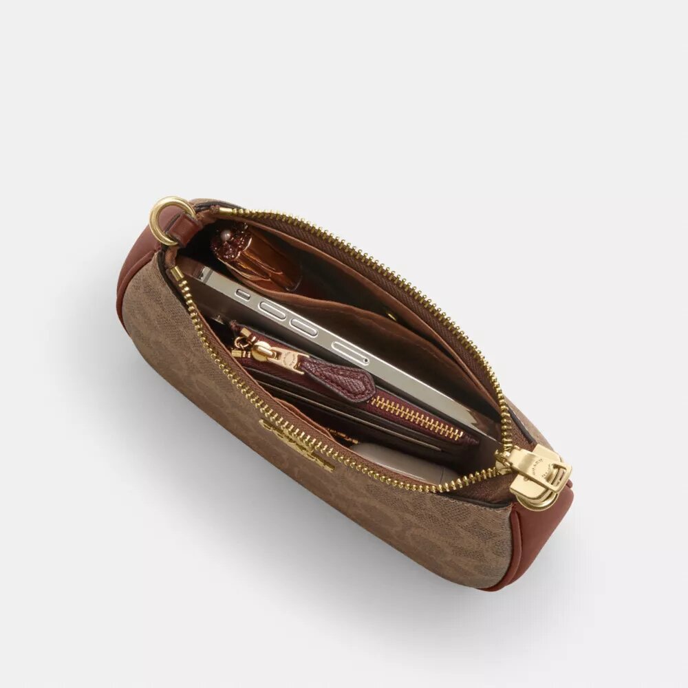 Teri Mini Crossbody Bag in Signature Canvas