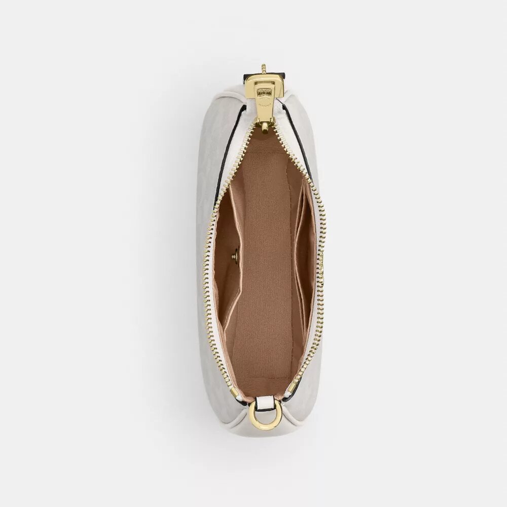 Teri Mini Crossbody Bag in Signature Canvas