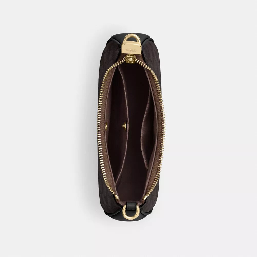 Teri Mini Crossbody Bag in Signature Canvas