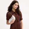 Teri Mini Crossbody Bag in Signature Canvas