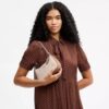 Teri Mini Crossbody Bag in Signature Canvas