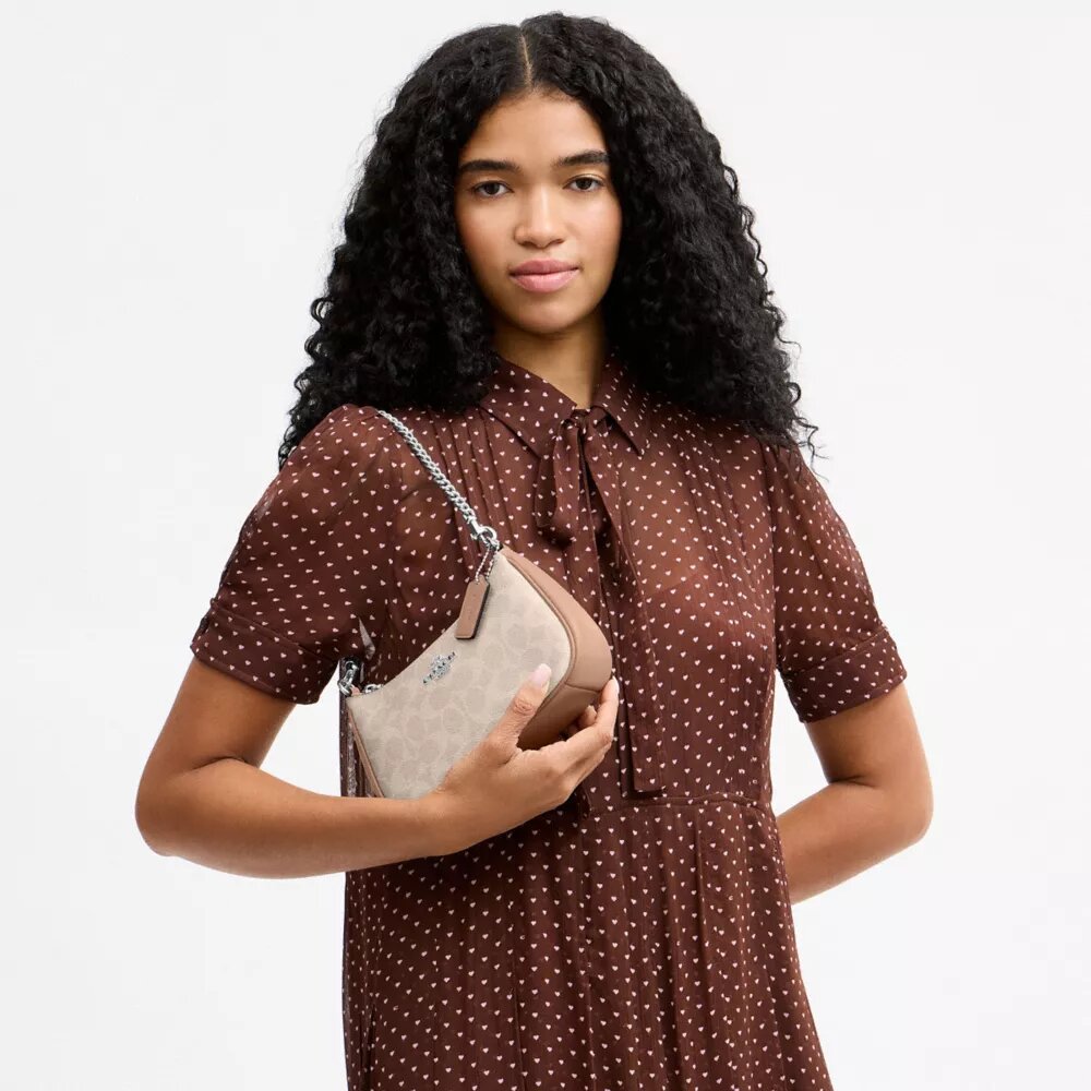Teri Mini Crossbody Bag in Signature Canvas